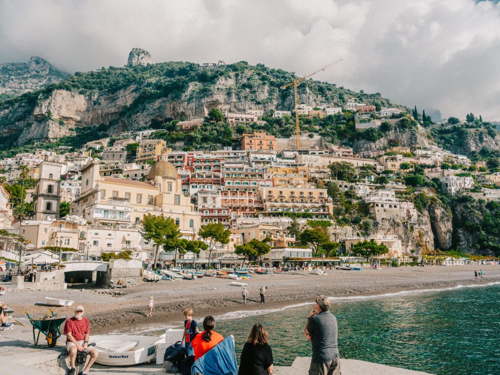 Scenic coastal town on cliffside overlooking the ocean, a vacation destination view