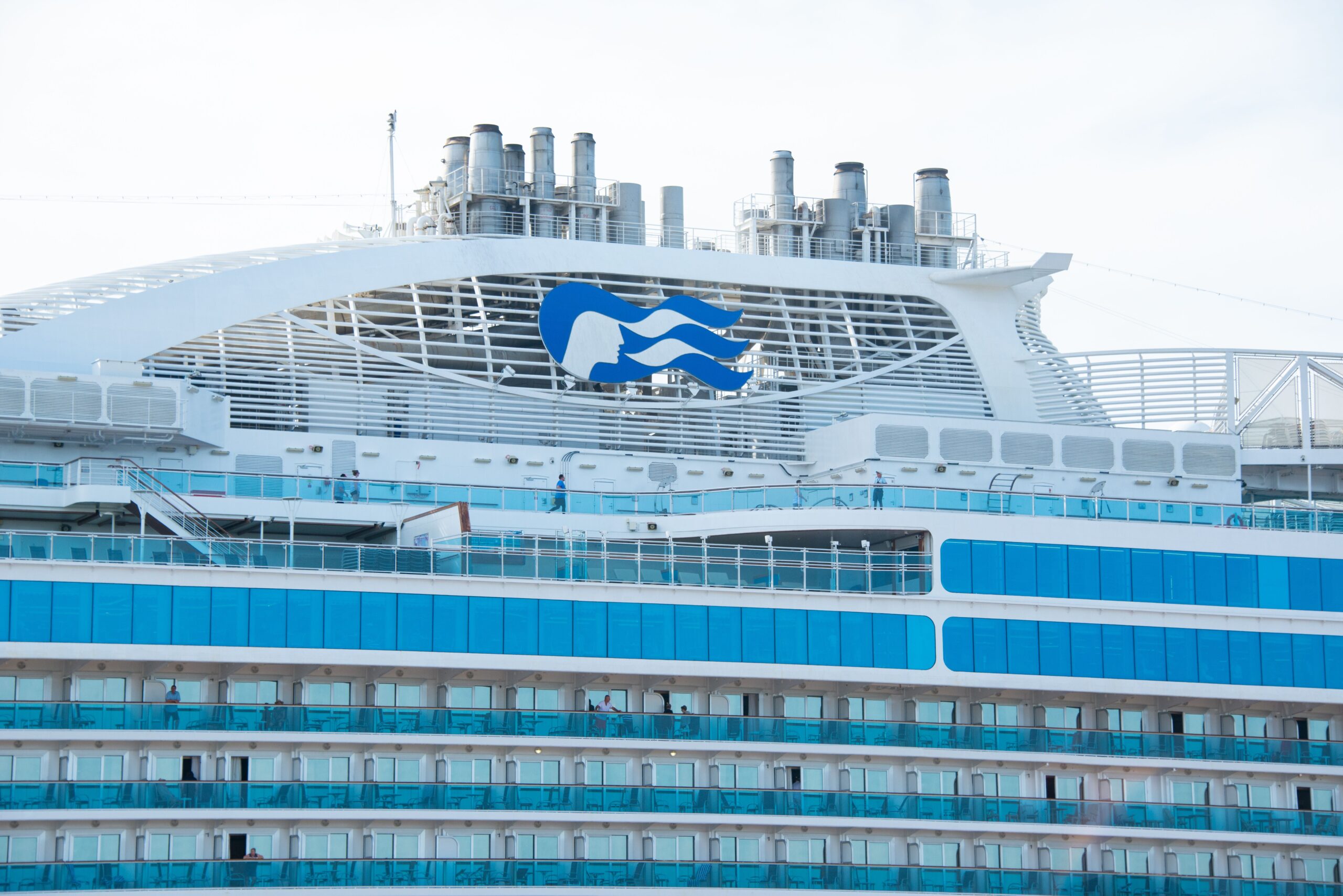Cruise ship docked at port, the kind of prepaid trip where travel insurance questions matter most