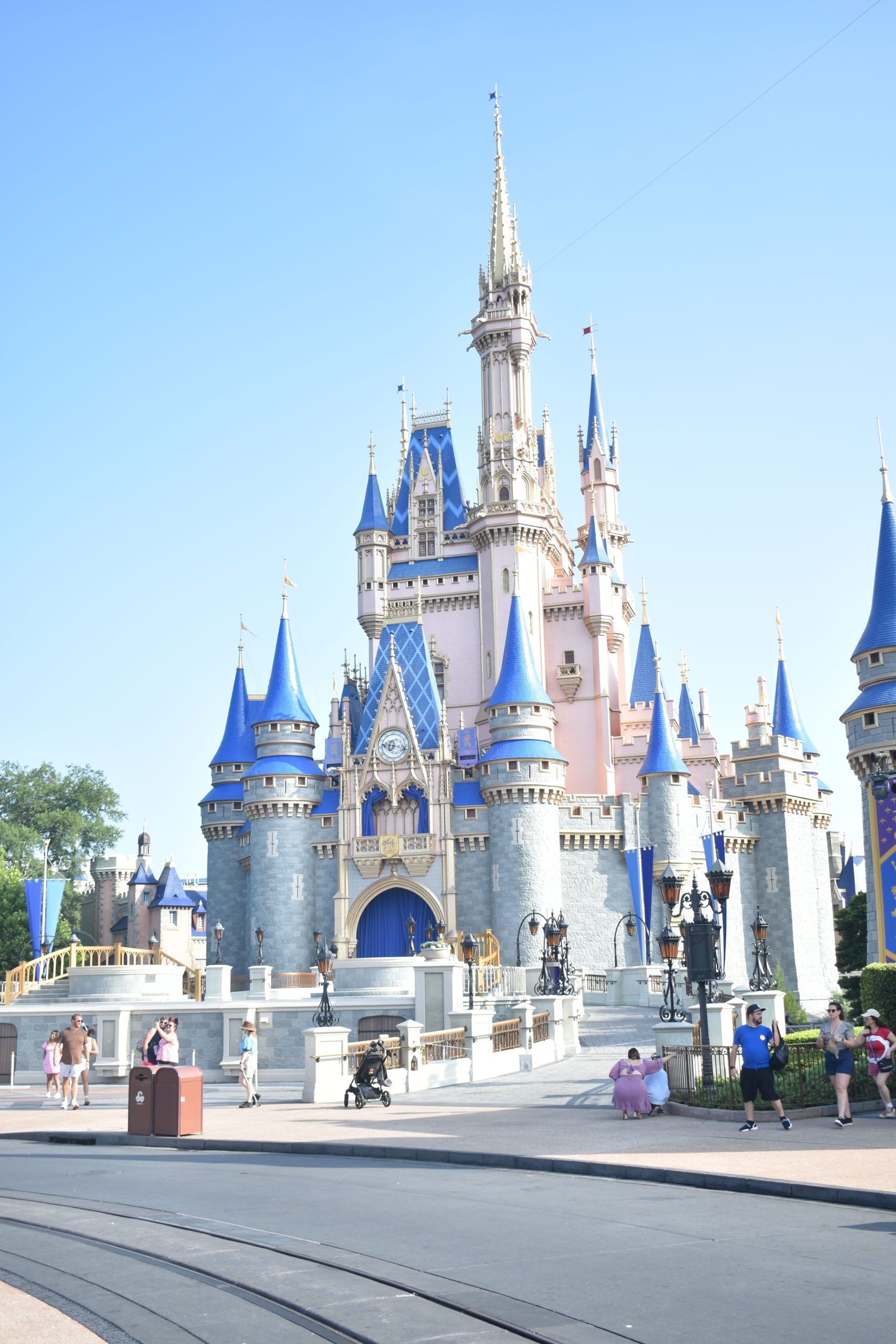 Cinderella Castle at Walt Disney World's Magic Kingdom, representing Disney and Universal theme park trips.