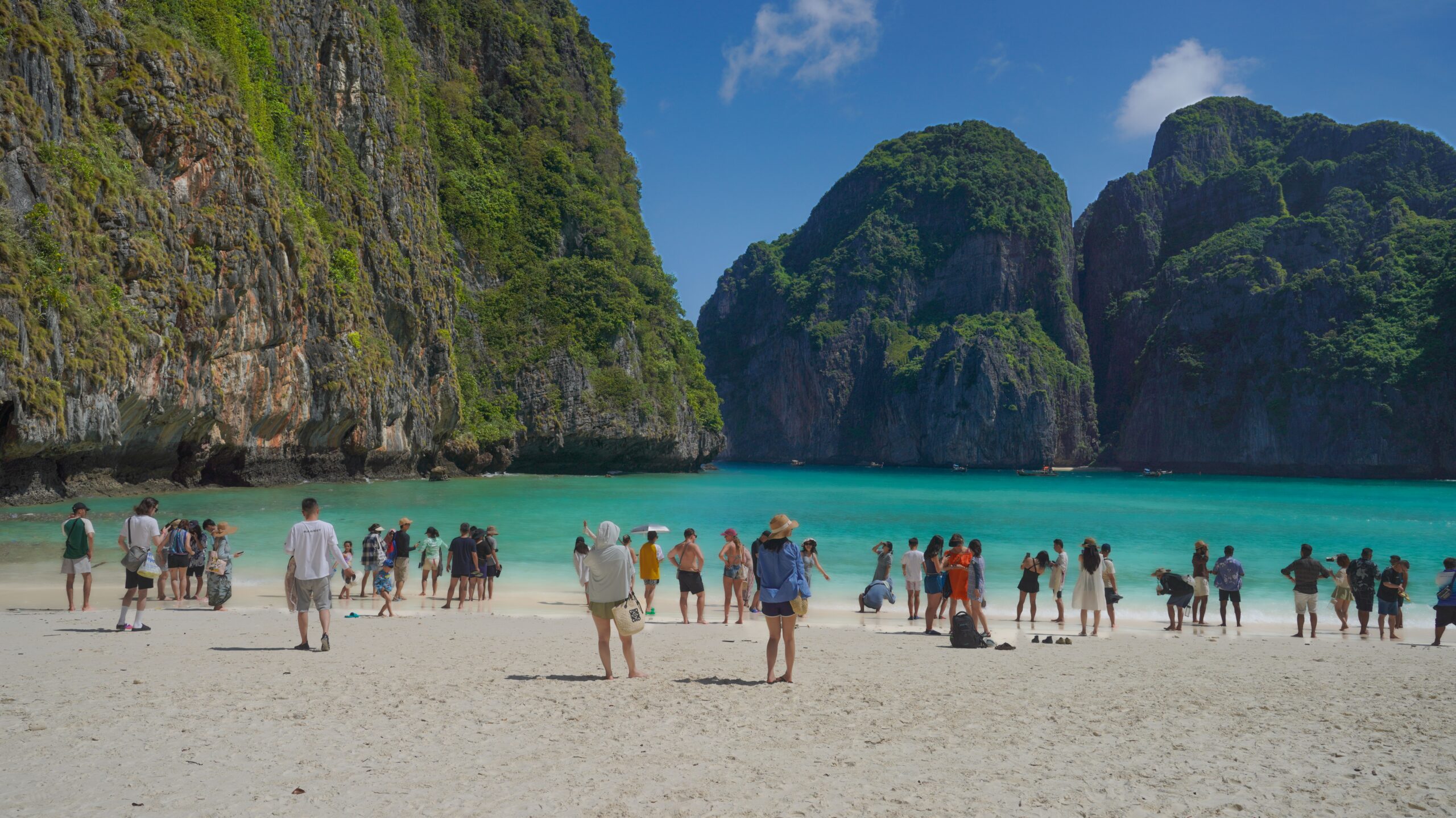 Scenic tropical bay with green cliffs, a reminder to build in room to simply enjoy the view